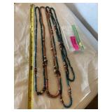 Collection of wood beaded necklaces four strands