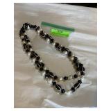 1950s two strand with brooch style clasp,
