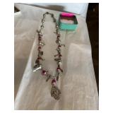Silvertone charm necklace with pendant made in