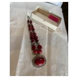 Vintage cranberry colored lucite/plastic ? Bead