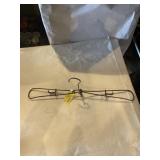 1910 folding clothes hanger  18 inches long when