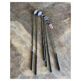 Golf irons 7, 5, 3 and putter and driver 1 and 3