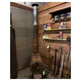 Antique wood heater with stove pipe about 26 high