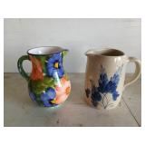 Two 6-in pitchers, one has blue bonnets on it