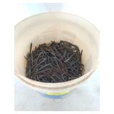 Bucket filled with fence staples, 15 lb+?