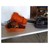 Two non-working chainsaws, one is a Sthil 021