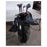 Dunlop golf club bag with two woods, seven