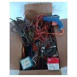 Box filled with lightweight extension cords, hot