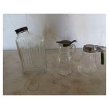 An 8-in. Anchor Hocking orange juice container