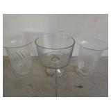 Two 9 in glass vases and a 9 inch trifle dish
