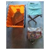 Orange plastic storage container with an old