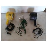 Three assorted spotlights, two have cigarette