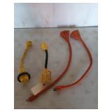 Two 110 three ways, and two 30 amp RV cords
