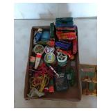 Flat filled with fishing supplies, including l