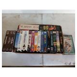 18 VHS tapes, three have original plastic wrap
