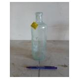 Light blue glass bottle, Moxie nerve food Lowell