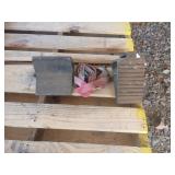 Wheel chocks and a 1-in ratchet strap