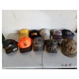 10 Assorted baseball caps, one is new with tags,