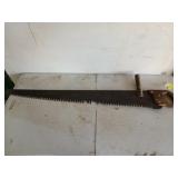 40 inch one man saw, missing a few teeth