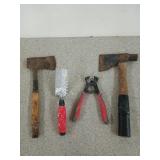 Two hatchets, a tile nipper, and a trowel