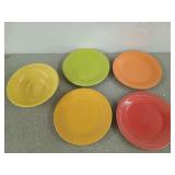 Four 10.5 inch Fiesta dinner plates in green,