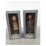 Two Duck Commander bobbleheads, Kay and Jase