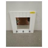 Cute mirror with three hat hooks, 15x15 in