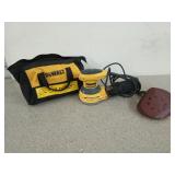 DEWALT orbital sander in tool bag with extra