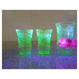 Set of three uranium glass shot glasses, three
