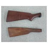 Two unknown wooden gun stocks, 13 and 14 in