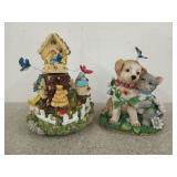 Two music boxes, one is bird houses, one is a
