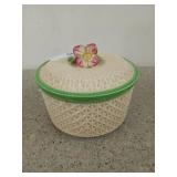 Basket shaped trinket box with with green rim