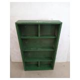 Green knick knack shelf marked "Harris, 16",