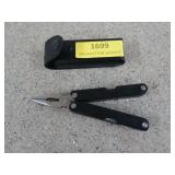 Folding multi-tool with case