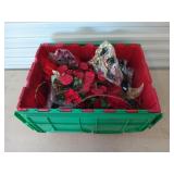 Green and red tote of Christmas decor, mostly