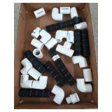 Assorted half inch PVC couplings, and 3/4 in cut