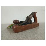Old wooden based Stanley hand planer number 135