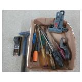 Assorted tools, mostly scrapers and screwdrivers