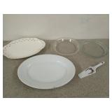 Two glass pie dishes, one is pyrex, and two