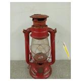 13 in red railroad lantern, missing a piece near