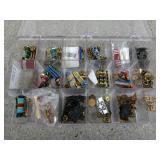 Plastic organizer filled with military pins,