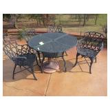 Cast aluminum table and four chairs 27x42