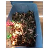 Blue 30 gallon storage tub filled with