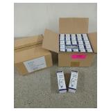 Two boxes filled with new, 25 watt, candelabra