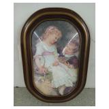 Old wooden bubble frame with young love artwork,