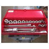 Red metal proto toolbox with 3/4 in breaker bars
