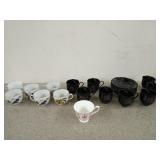 Teacup collection, including an 8-piece black