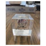 1969 half dollar paperweight from the State Bank