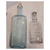 Vantage expectorant and extract bottles