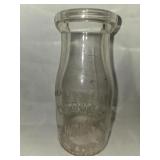 Glass pint Guernsey dairy cream bottle .